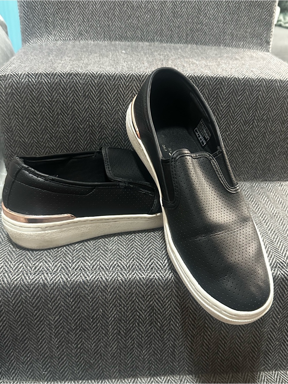 Skechers Black Slip-On Sneakers with White Sole and Rose Gold Accent
